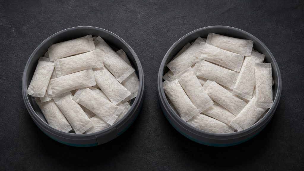 Top-down comparison of realistic slim pouches in two original low-profile round cans